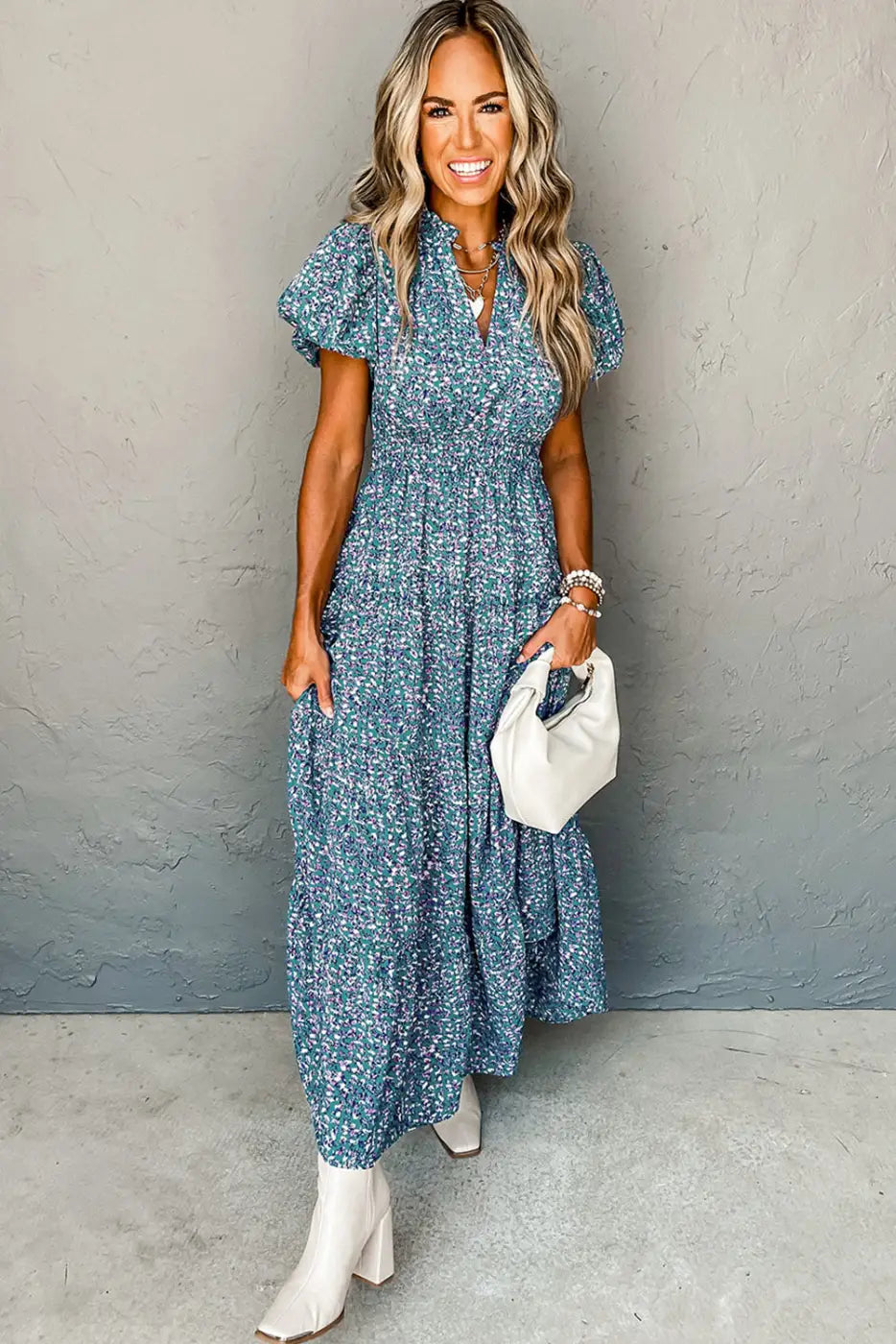 Short puff sleeve blue floral maxi dress with tiered skirt for relaxed style