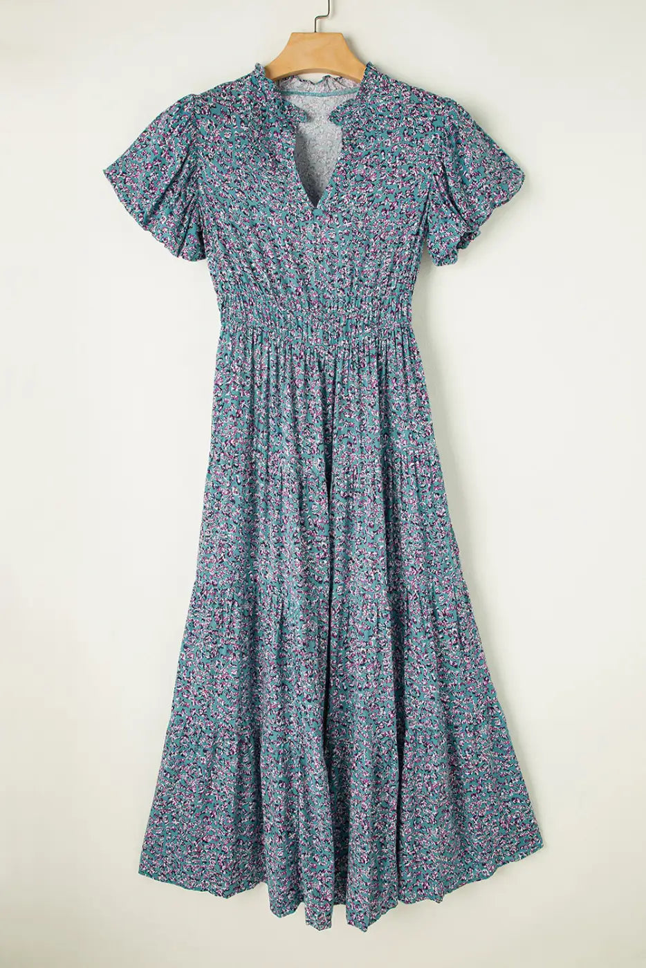 Short puff sleeve floral print maxi dress with tiered skirt on hanger for relax relax style