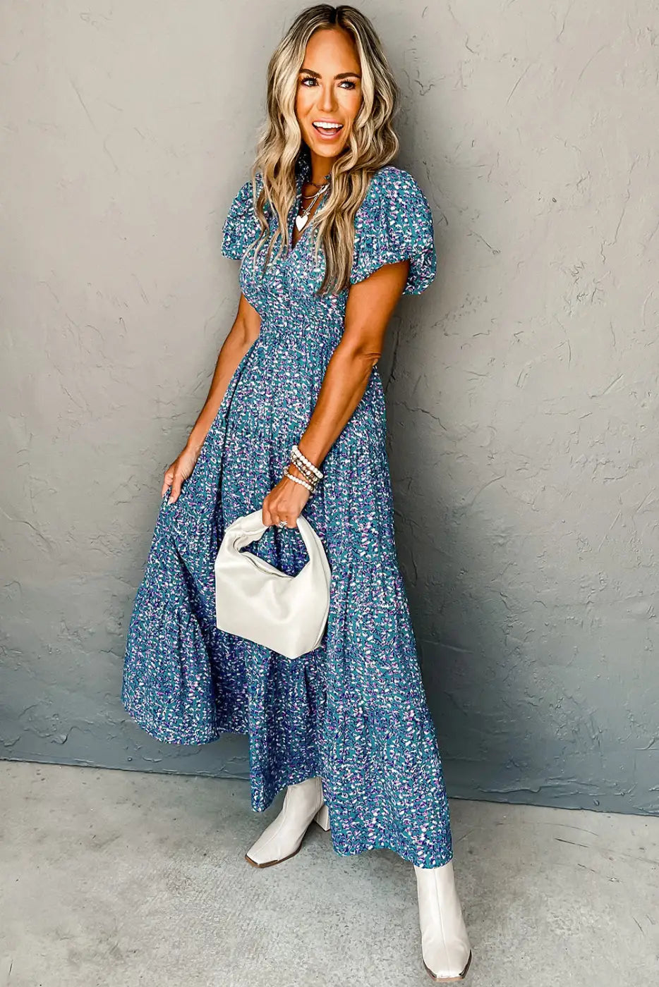 Blue floral short puff sleeve maxi dress with a tiered skirt for a relax relax vibe