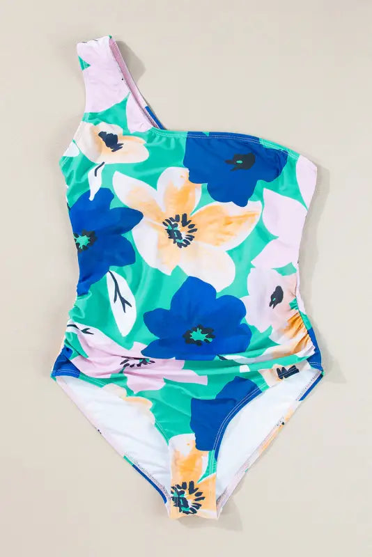 One shoulder monokini - green floral ruched cut out with a blue and peach flower pattern