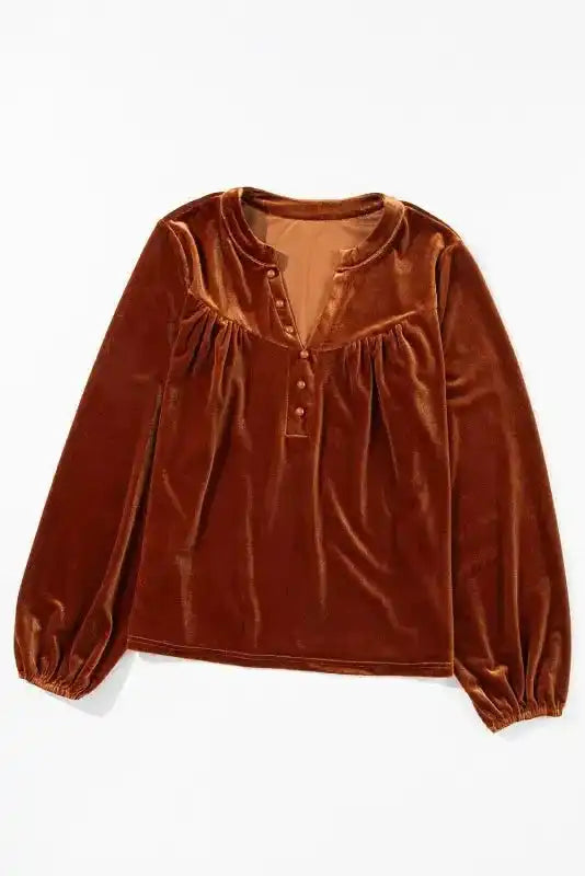 Front view of Skobeloff velvet blouse featuring beaded buttons and soft gathered detailing, ideal for elegant winter outfits.