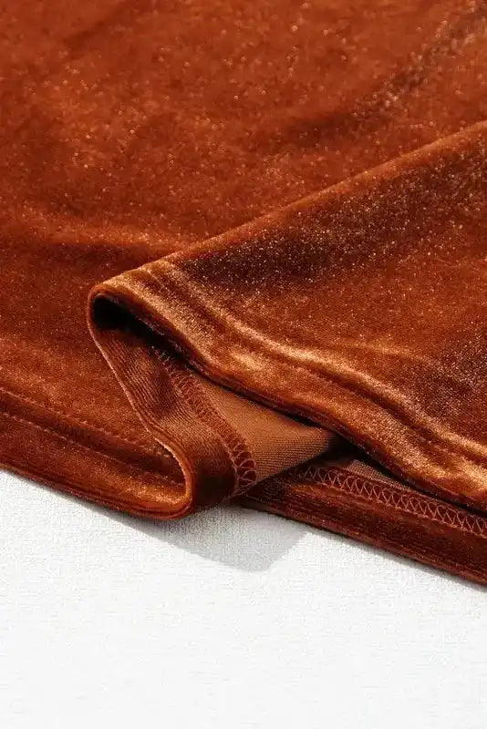 Detailed hem of the Skobeloff velvet blouse showing fine stitching and plush velvet finish for a refined, elegant look.