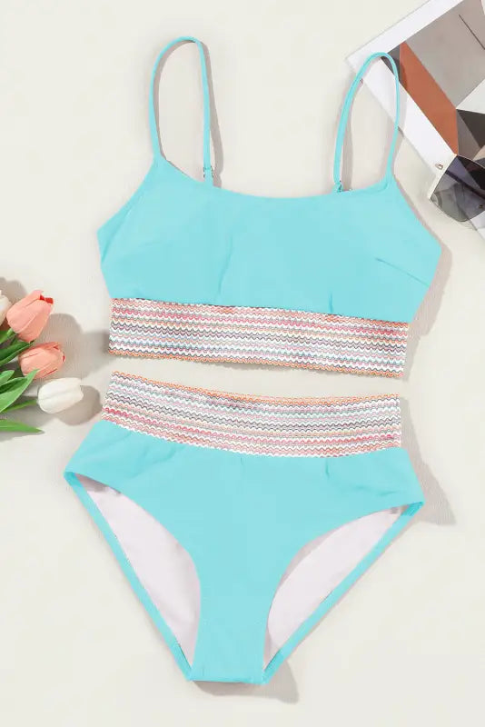 Sky blue striped patchwork high waist bikini with colorful bands, perfect for relaxing