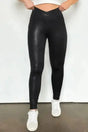 Sleek Leather Leggings - Women's Leggings FashionFitz in black with a unique crossed dip waist, styled for a flattering bodycon silhouette.