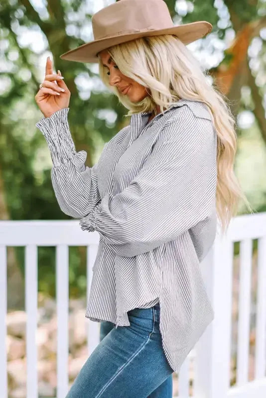 Back view of striped boyfriend shirt showing relaxed fit and smocked cuff detail Fashionfitz UK