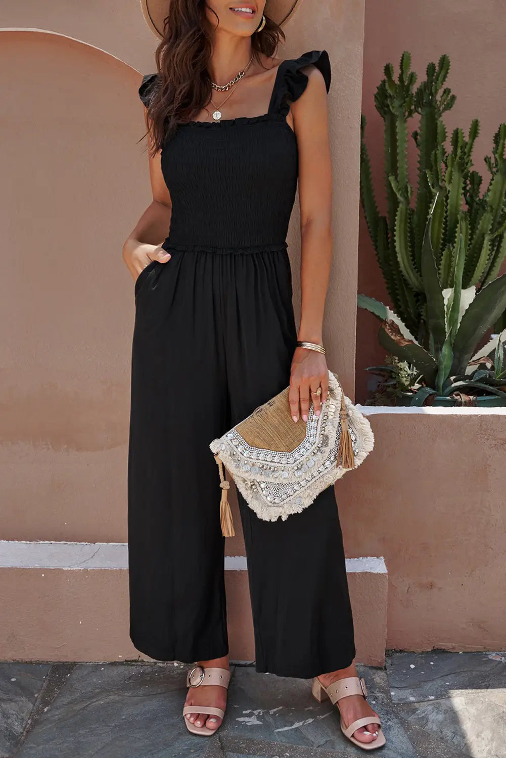 Smocked pocketed ruffled sleeveless wide leg jumpsuit - black / s / 55% viscose + 45% polyester - jumpsuits & rompers