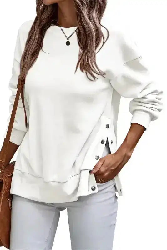 Black Snap Button Pullover with chic side splits in solid white, featuring long sleeves and a relaxed fit for casual winter wear.