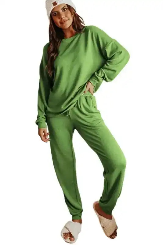 Isolated view of Spinach Green Jogger Pants Lounge Set featuring soft fabric and relaxed fit, ideal for women's matching loungewear sets.