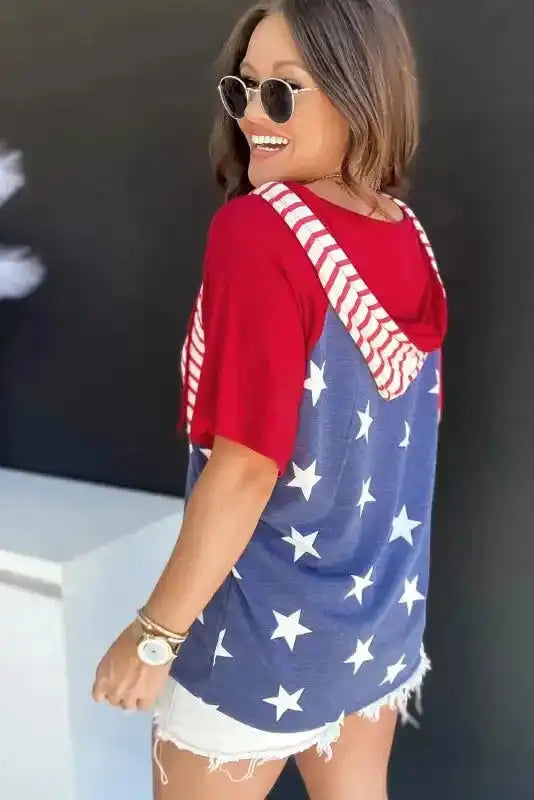 Back view of Stars and Stripes Hooded Drawstring V-Neck Tee showing hood silhouette and drawstring detail — Fashionfitz