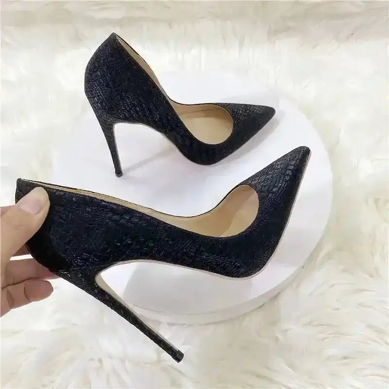 Black snake skin FashionFitz stilettos with ultra-high heels and pointed toes, perfect for elegant women's pumps in Apparel & Accessories.
