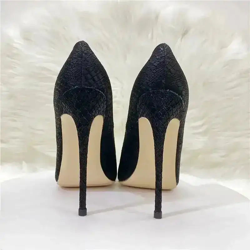 Rear view of black snake skin stilettos by FashionFitz, showcasing slim high heels and elegant PU finish for women's pumps.