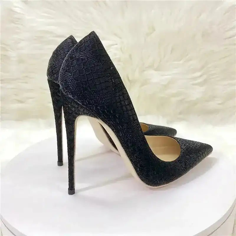 FashionFitz Stiletto Heels in black snake skin pattern with pointed toes and PU finish, ideal for bold fashion in women's pumps category.