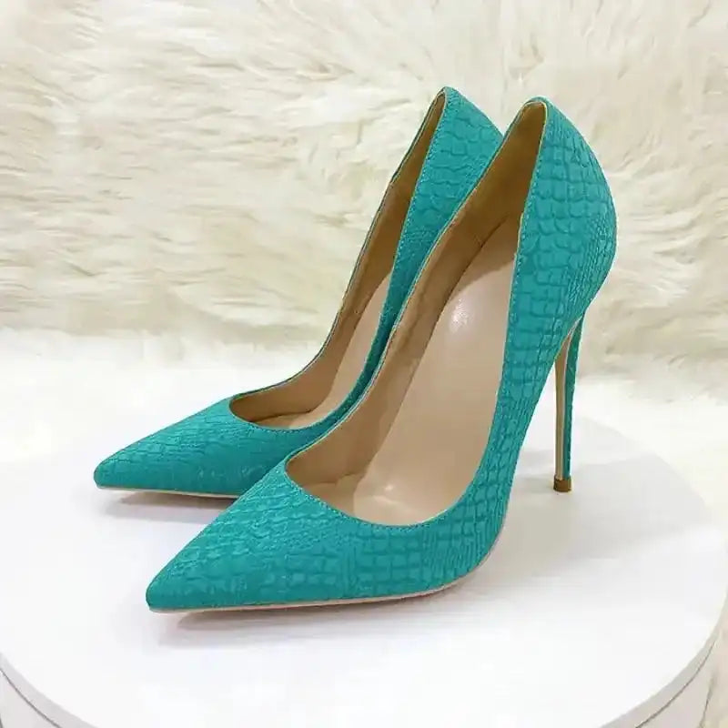 Angled view of turquoise FashionFitz Stiletto Heels with snake skin texture, pointed toes, and slim high heels for chic women's footwear.