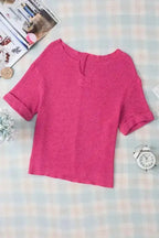 Flat lay of Strawberry Pink Knit Split‑Neck Top with short sleeves and split neckline, ideal for casual summer wardrobes and easy layering.
