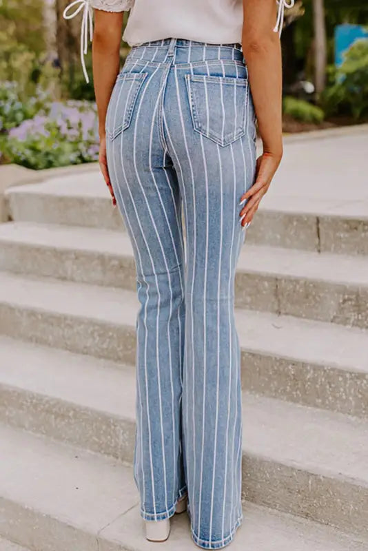 Striped ripped flare jeans