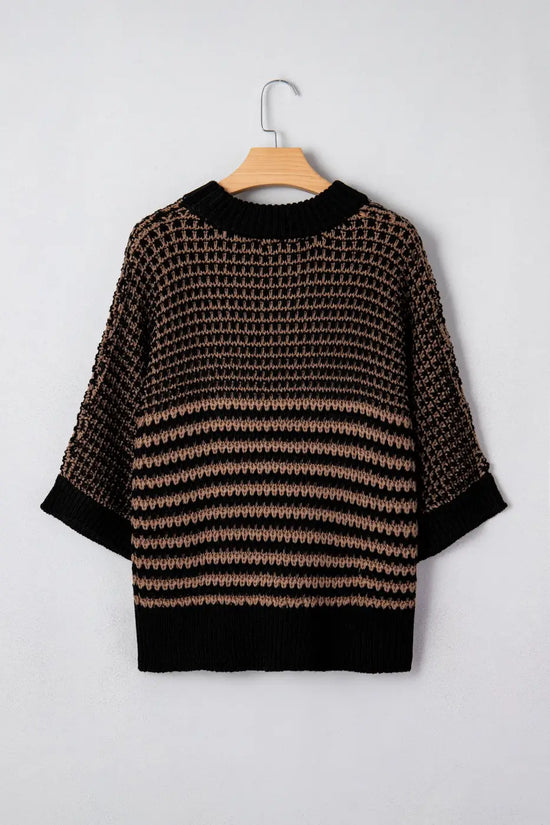 Back view of striped soft-knit slouchy jumper in black and taupe. Lightweight knit with short sleeves and ribbed trim for casual wear.