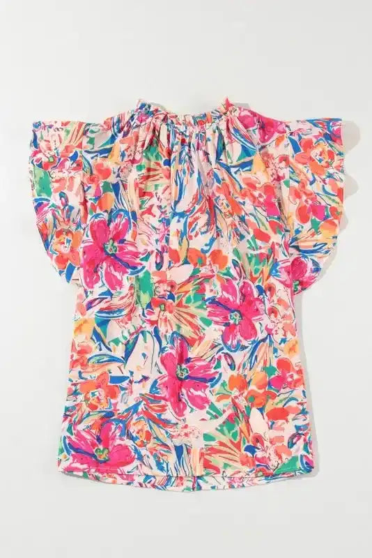Side view of Floral Ruffled Sleeve V-Neck Blouse showing ruffled cap sleeve movement and V-neckline detail — Fashionfitz