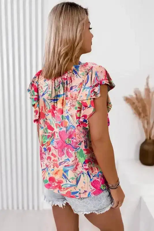 Back view of Floral Ruffled Sleeve V-Neck Blouse showing relaxed shift silhouette and lightweight summer fabric — Fashionfitz