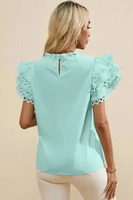 Back view of Mint Green Layered Cap Sleeve Frilled Neck Blouse showing cap sleeves and relaxed silhouette — Fashionfitz