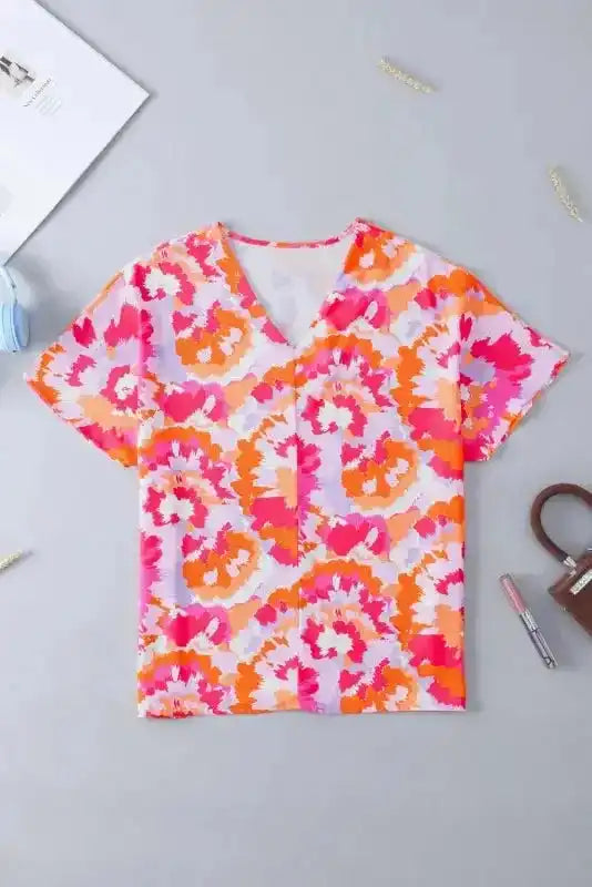 Close-up of Rose Red Abstract Print V-Neck Blouse showing vibrant abstract print and shirred bodice detail — Fashionfitz