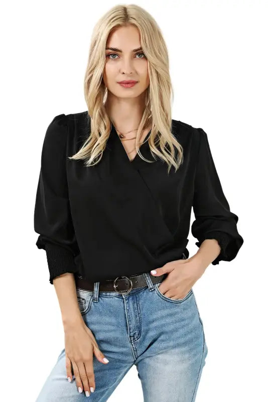 Black solid surplice neck shirred cuffs draped blouse - tops