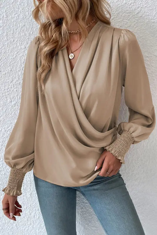 Black solid surplice neck shirred cuffs draped blouse - tops