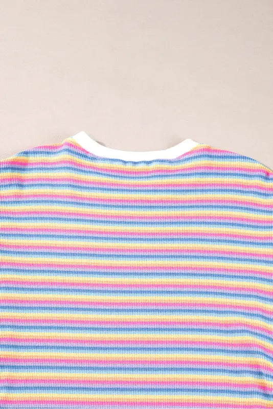 Relax in style with our colorful striped t-shirt dress, featuring pink and rainbow stripes