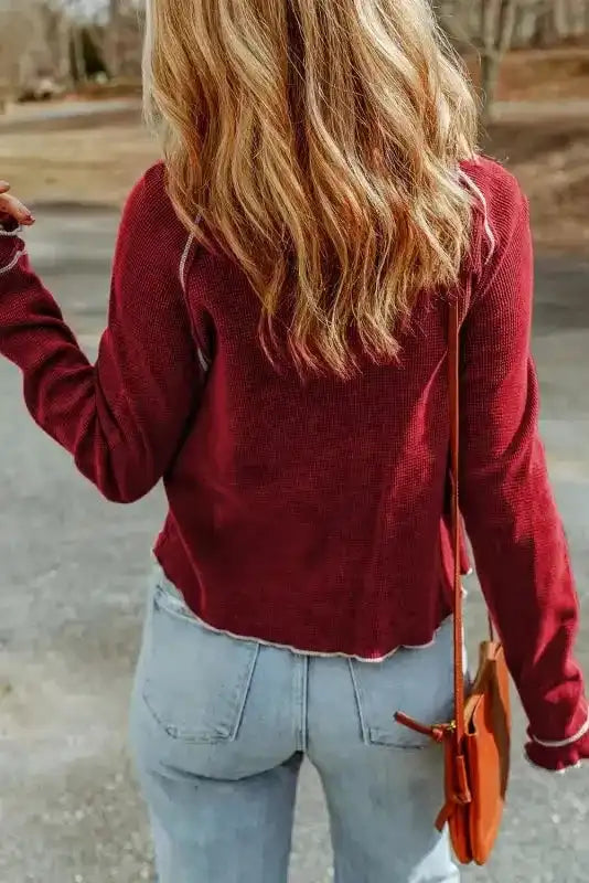 Back view of red Round Neck Textured Top showing relaxed fit and waffle knit texture, perfect for daily fall outfits.