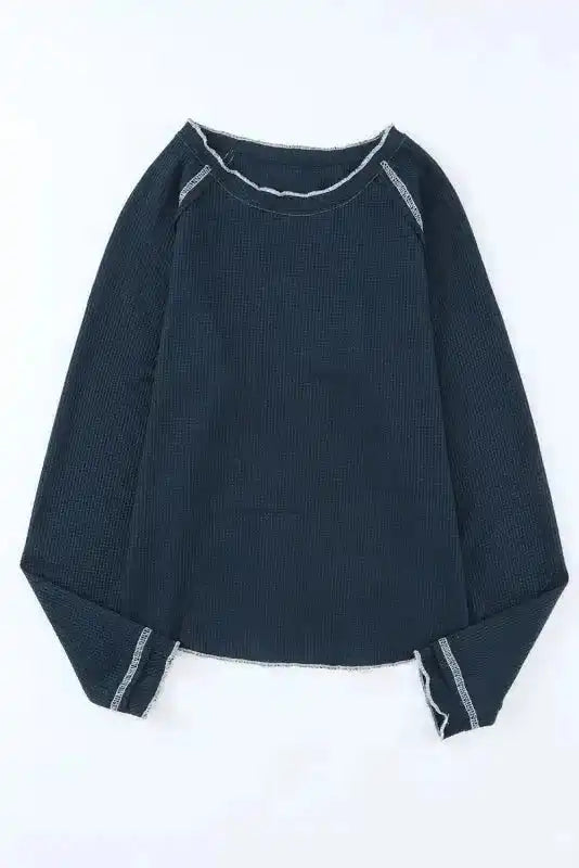 Flat lay of navy blue Round Neck Textured Top showing front design, contrast seams, and long sleeves for casual styling.