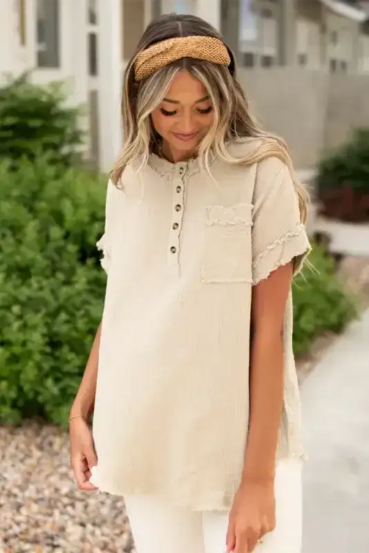 Front view of Crinkle Frayed Tunic Top featuring short sleeves, chest pocket, and relaxed silhouette for summer wear.