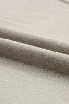 Close-up of soft fabric texture of Smoke Gray Batwing Tee, showcasing its breathable and comfy material.