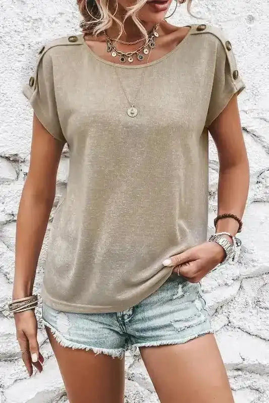 Smoke Gray Batwing Tee with button detail on shoulders, styled with denim shorts for a casual summer look.