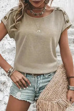 Smoke Gray Batwing Tee paired with distressed shorts and accessories, highlighting its chic button shoulder design.