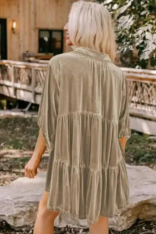 Back view of khaki Shop Velvet Tunic Babydoll Shirt, highlighting tiered design and flowy velvet fabric for autumn fashion.