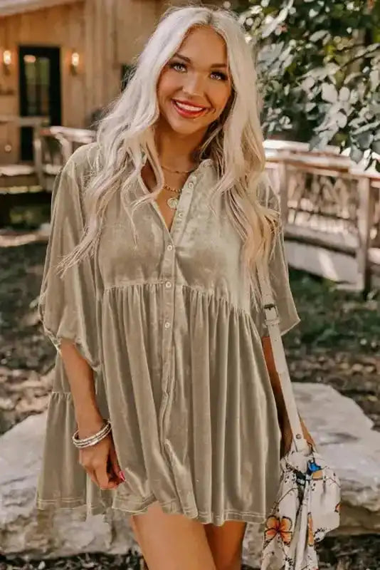 Front view of khaki Velvet Babydoll Tunic styled outdoors, featuring soft velvet texture and relaxed Southern Belle silhouette.