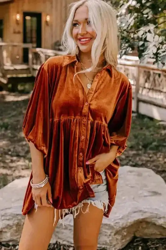 Rust orange Velvet Tunic Babydoll Shirt styled with distressed shorts and layered jewelry, ideal for a Southern Belle fall look.