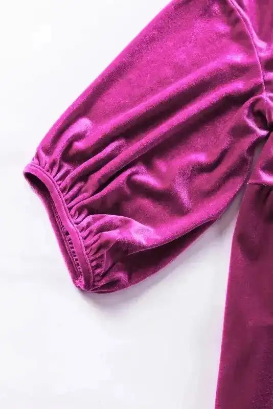 Elastic puff sleeve detail on Velvet Tunic Babydoll Shirt, adding a stylish Southern Belle touch to the fall-ready top.