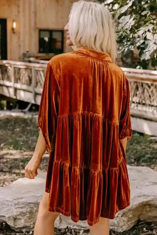 Back view of rust orange Velvet Babydoll Tunic showing tiered A-line design and soft velvet fabric, perfect for fall outfits.