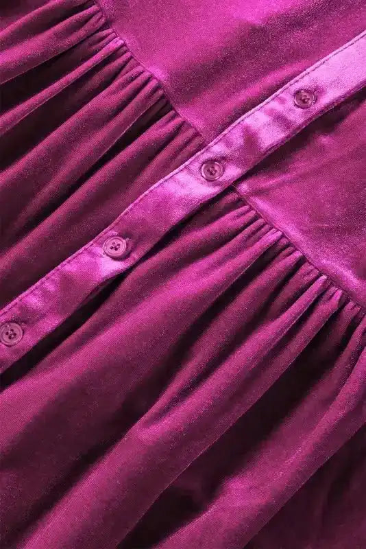 Detailed view of button placket and gathered waist on Velvet Babydoll Tunic Shirt, emphasizing its feminine silhouette.