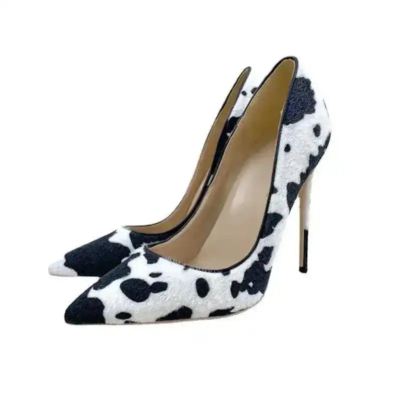 Pair of Urban Artistry Stilettos – Black & White Graffiti Heels by FashionFitz, featuring edgy street art-inspired design and pointed toe silhouette.