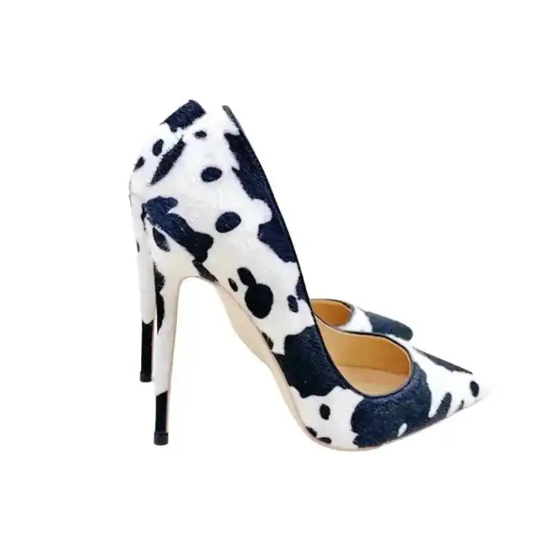 Side profile of Urban Artistry Stilettos with black and white graffiti design, highlighting the slim stiletto heel and bold artistic pattern.