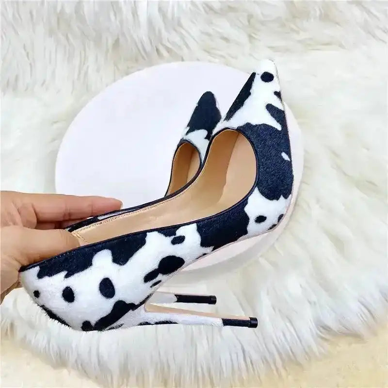 Close-up of Urban Artistry Stilettos – Black & White Graffiti Heels showcasing pointed toe and high stiletto heel, ideal for fashion-forward outfits.