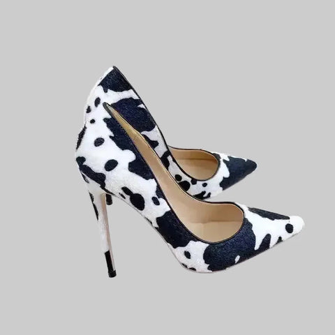 Urban Artistry Stilettos – Black & White Graffiti Heels from FashionFitz with bold abstract print and pointed toe design on faux fur texture.