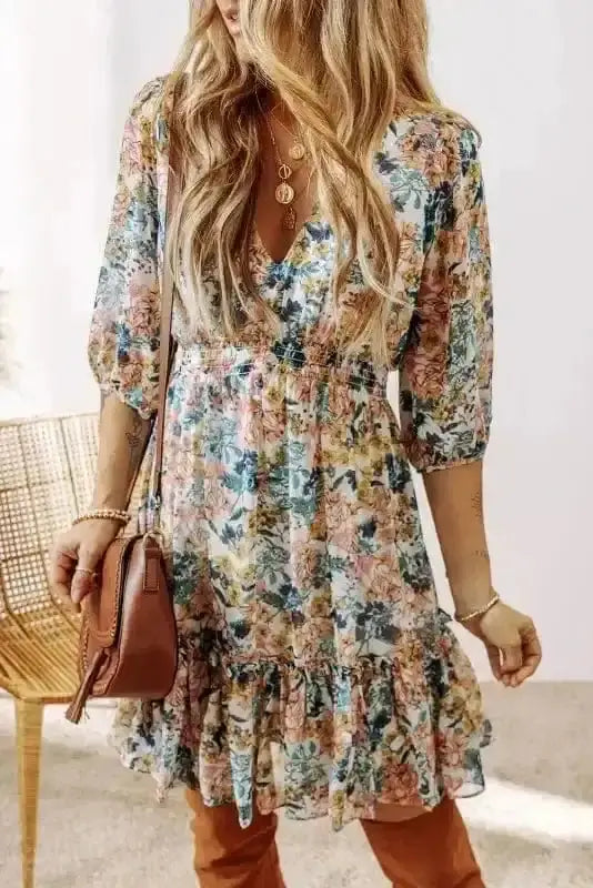 Sky blue floral smocked V-neck 3/4 sleeve mini dress front view — Fashionfitz UK