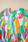 Vibrant abstract ruffle plus size mini dress sizes