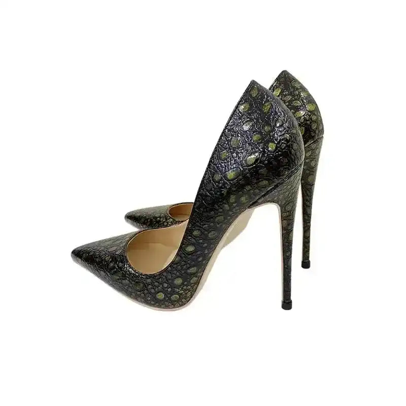Pair of snake-effect stiletto heels in black-green PU leather with pointed toes and tall stilettos, ideal for UK fashion-forward events.