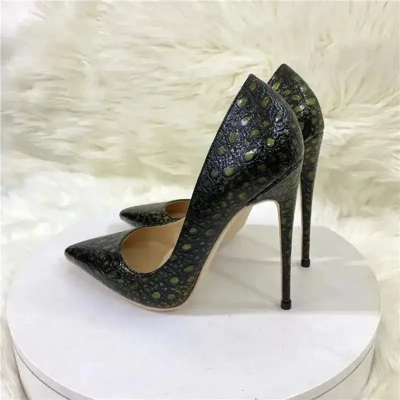 Back-side view of snake-effect stiletto heels with elegant high heel silhouette and textured PU leather, designed for bold fashion statements.