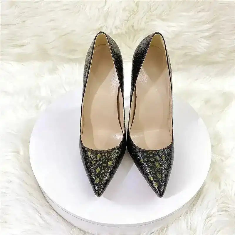 Front view of snake-effect stiletto heels showcasing pointed toe design and sleek PU leather finish, ideal for night out or special occasion wear.