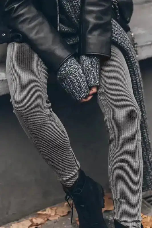 Vintage Wash Ribbed Leggings - Dark Grey worn with a leather jacket and boots, perfect for a cozy winter streetwear look.