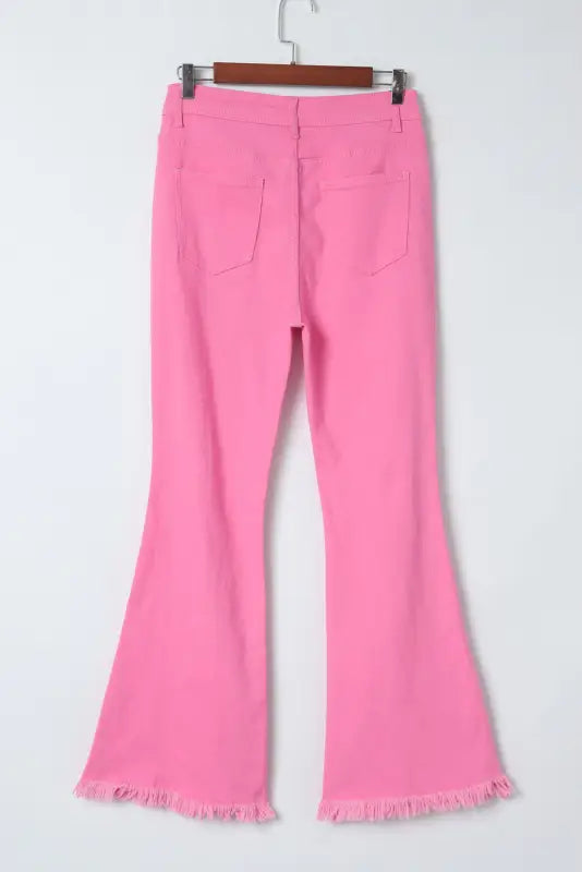 Pink vintage high waist flare leg ripped raw hem jeans